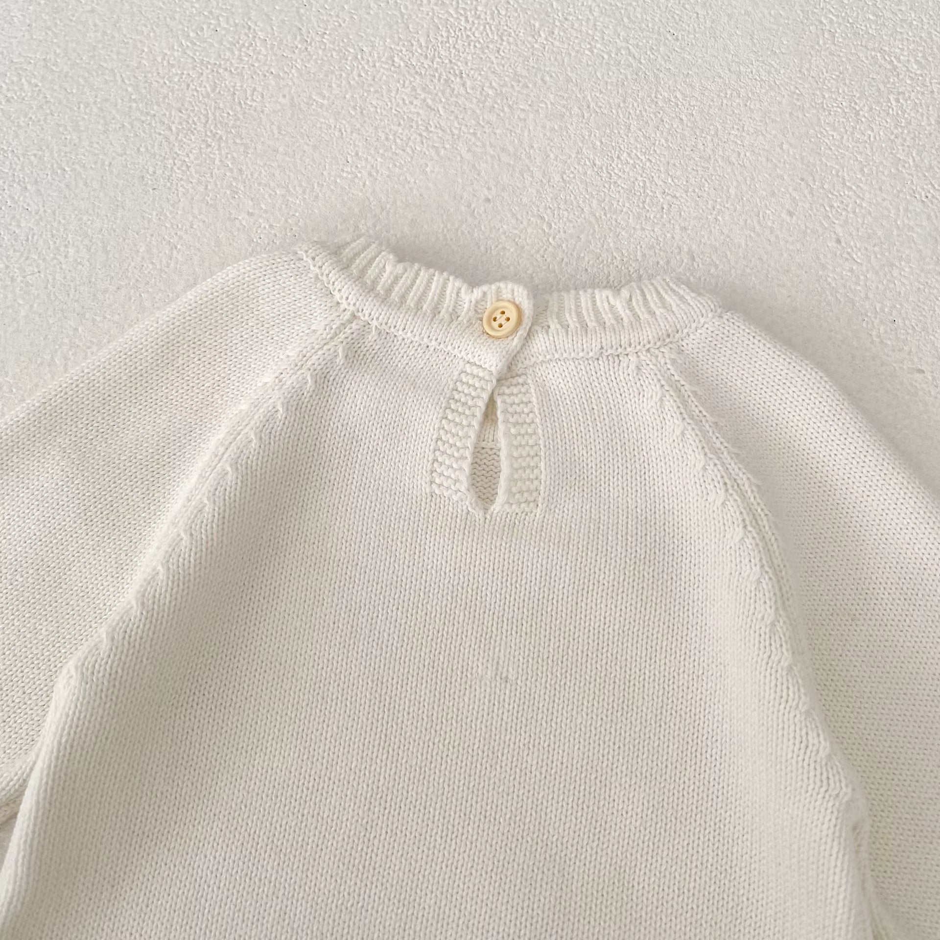 Angelie Petal Knit Romper
